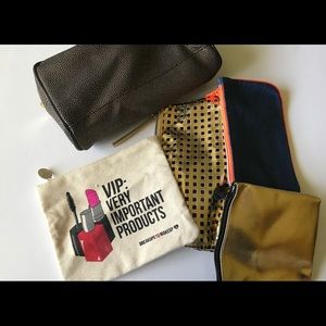 Five cosmetic bags/pouches